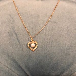 Gold necklace with heart charm, faux pearl